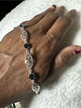 Sterling Silver Celtic knot Link Bracelet with Emerald Green Stones